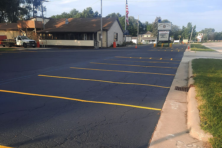 Professional Sealcoating, Line Striping, Crack Filling & Hot Patching in Montgomery Illinois
