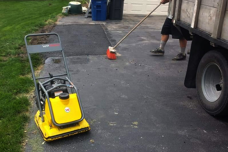 Professional Sealcoating, Line Striping, Crack Filling & Hot Patching in Montgomery Illinois